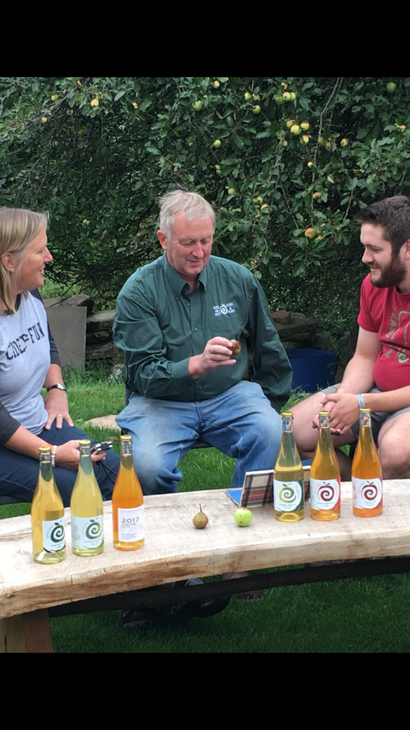 Cider Episode 194 Mike Johnson of Ross Cider seeing a smiing Talking Pomme looking back up at him