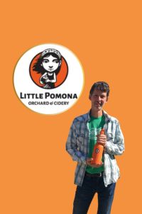 Cider Chat Ep 460 James Forbes holding a bottle of cider with Little Pomona logo overhead