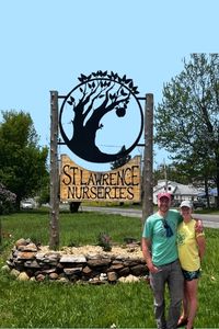 Episode 466 Feature photo Connor and Allyssa Hardiaman in front of Saint Lawrence Nursery sign